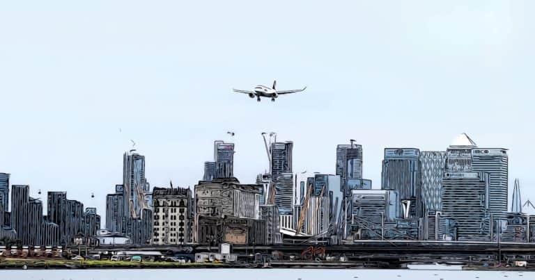 canary wharf transport links showing plane landing at london city airport canary wharf background