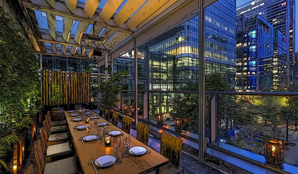 rooftop terrace and bar at ROKA canary wharf with views across canada square park