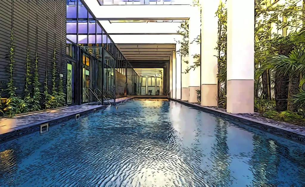 Atrium at Buckingham pools designed outdoor pool and spa area at Wardian London 